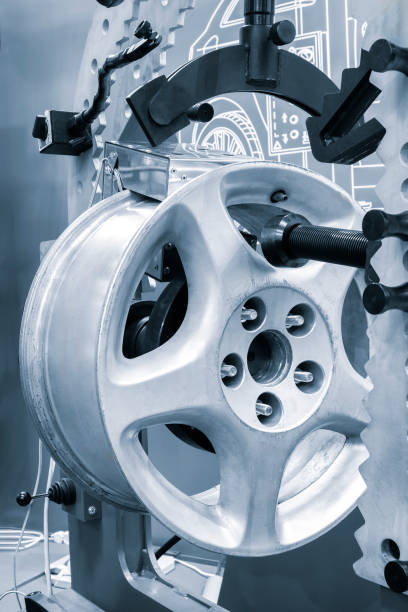 istock Machine for repairing and balancing car wheels isolated on a white background 2071280992