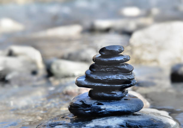Harmony and balance represented by a tower of stacked pebbles.