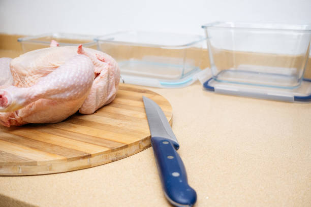 Cook with a chicken prepared to cut.