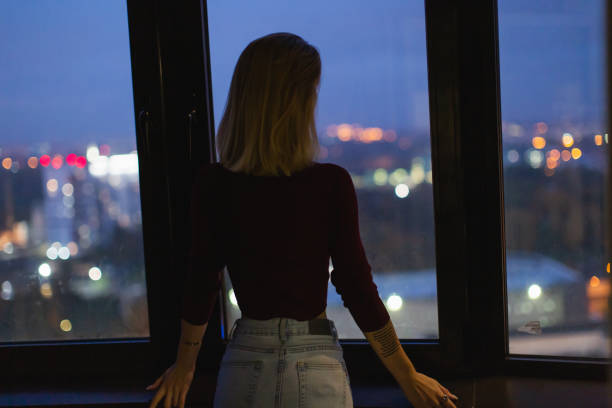 istock Blonde woman feeling depressed on the balcony. 2071288731