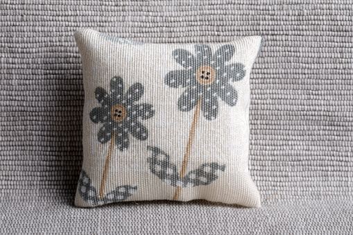 Pillow with checked and spotted  flowers