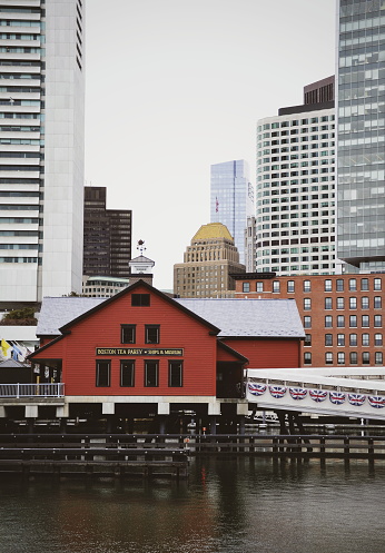 Boston Tea Party Museum with skyscrapers in the background in Boston, United States, on February 13, 2020