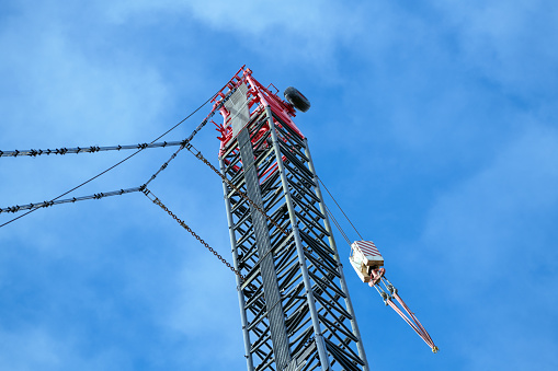 Construction crane rises into the sky