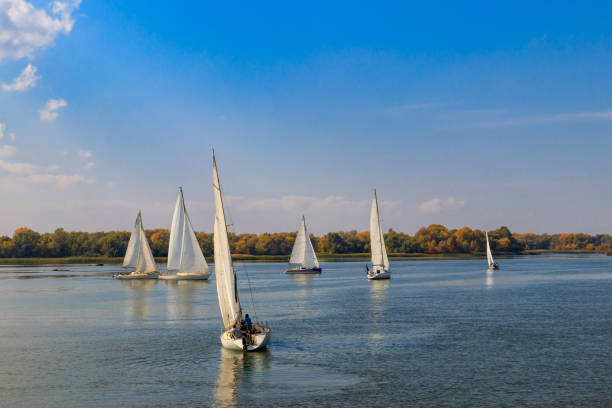 Yachts at sailing regatta on the Dnieper river in Kremenchug, Ukraine