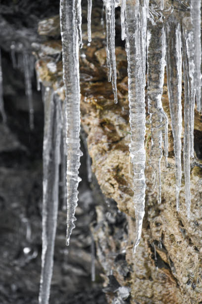 Winter scene. Icicles on the rock.\nHammerfest - Norway.