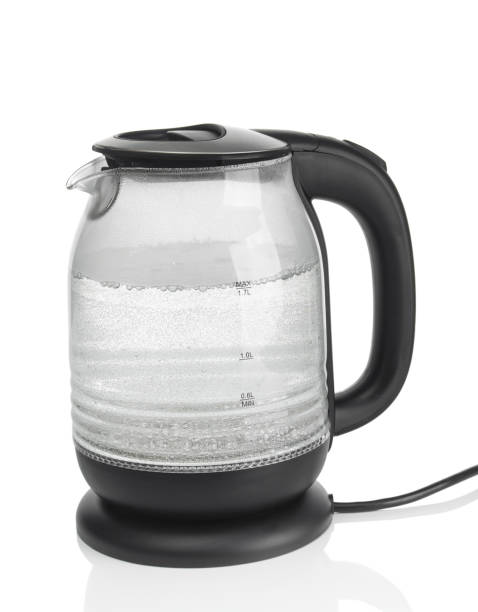 istock Modern electric kettle with boiling water  isolated on a white background 2071367615