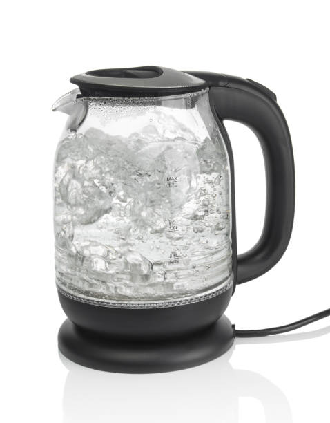 istock Modern electric kettle with boiling water  isolated on a white background 2071367616