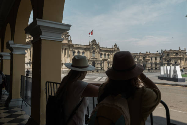 istock Silhouette of tourists in lima. 2071410830