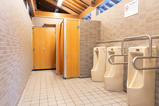 A clean and modern public restroom .