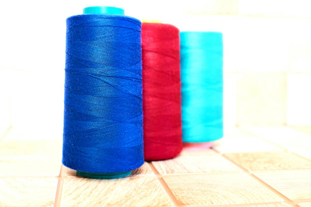 Sewing thread detail, copy space, full frame - Stock photo