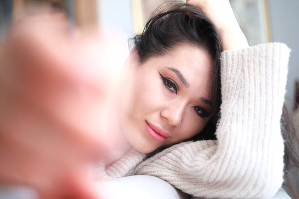 Relaxed woman rest lounge on couch enjoy peaceful day.