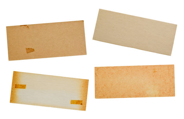istock Set of four old rectangular cardboard paper with aged yellow stains isolated cutout 2071581309