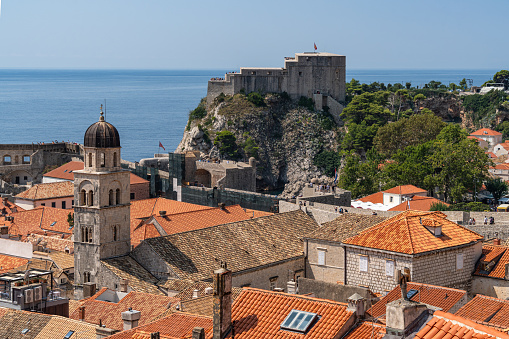 This photo captures a view of Dubrovnik city featuring Fort Lovrijenac in the background, showcasing the city historical charm