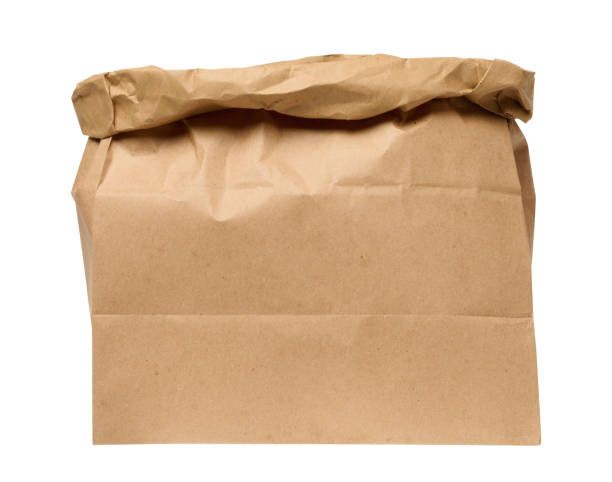 istock A large empty brown kraft paper bag for packaging products in stores on an isolated background 2071638500