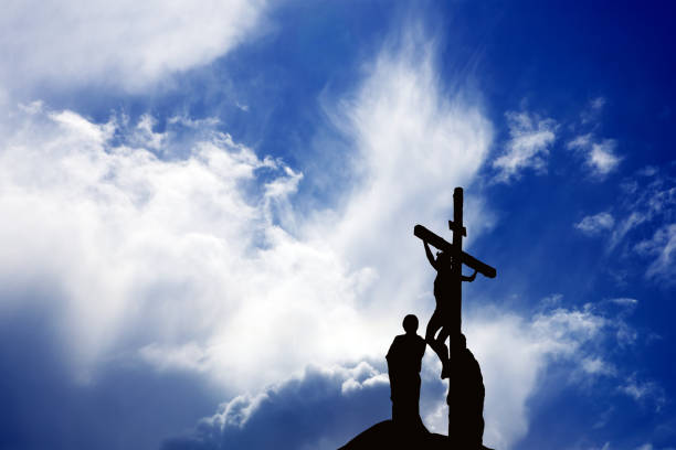 Religious cross on city background.