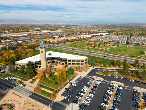 Aerial view of Westminster, a suburb of Denver in the state of Colorado, with the Westminster City Office building and Westminster Center Park in the foreground.