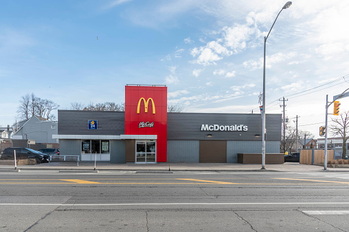 Toronto Ontario, Canada- March 8th, 2024: The exterior of a McDonald's franchise restaurant.