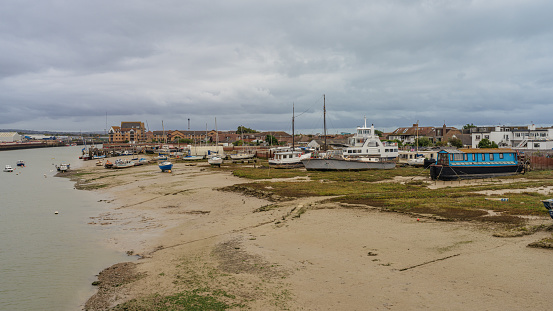 Shoreham-by-Sea, West Sussex, England, UK - October 04, 2022: Houseboats on the banks of the Adur River