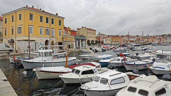 Rovinj, Croatia - October 15, 2014: Moored Boats at Marina Port in Old Town Autumn Day.