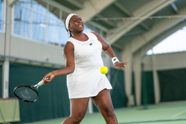 istock Tennis player hitting ball with racket 2071933999