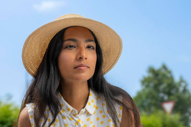 istock Young indian woman in sun hat 2071934554