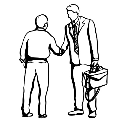Business people shaking hands.  One is wearing a suit and tie while holding a briefcase and the other just a dress shirt.