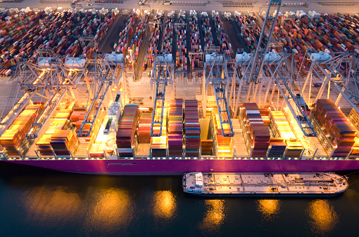 Aerial view of a large containership in a harbour, Rotterdam, The Netherlands