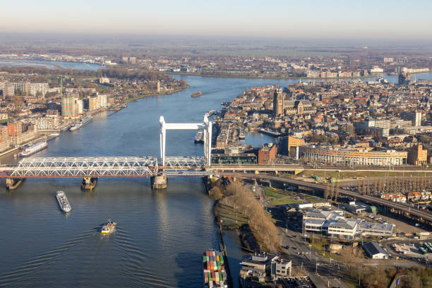 istock Dutch city Dordrecht with railway bridge over river Oude Maas 2072079123