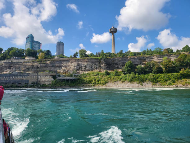 View of Skylon Tower and abandond Ontario Power Comany Generating Station at river level seeing from a boat tour