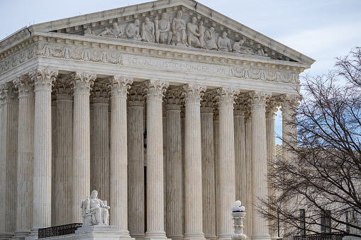 U.S. Supreme Court Close-up with blue sky background.