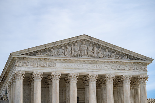 U.S. Supreme Court Close-up with blue sky background.