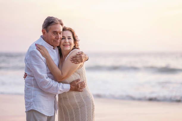 istock Happy mature couple in the beach 2072294545