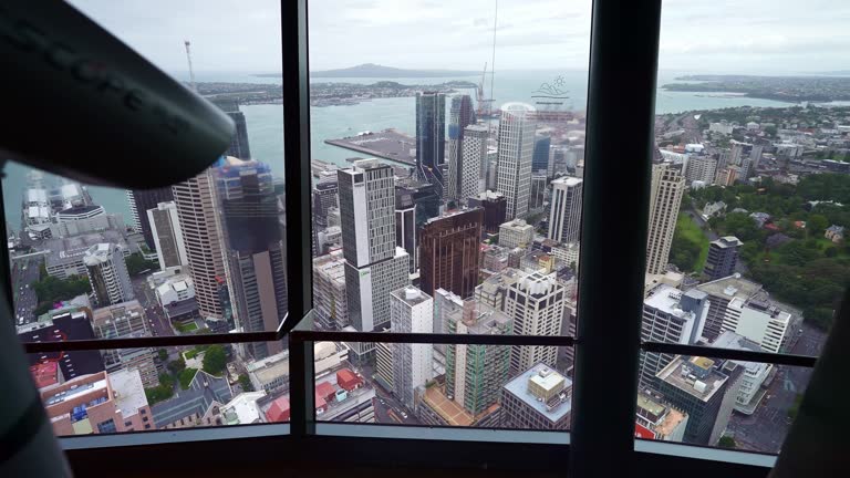 Auckland downtown seen from above, Sky Tower. New Zealand. modern commercial buildings in city center.