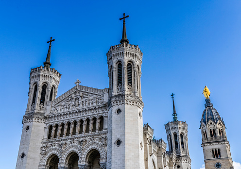 Towers Golden Mary Basilica of Notre Dame de Fourviere Outside Lyon France. Built from 1872 to 1896. Dedicated to Virgin Mary and thanks to God for victory over the socialists.