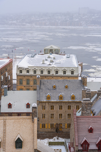 Quaint town of Quebec City overlooking colonial style buildings and Saint Lawrence River