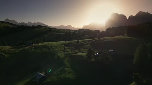 4K Aerial view Real time Footage of Seiser Alm at the sunrise time, Famous landmark in northern Italy. Europe Sunrise in Italian Dolomites.