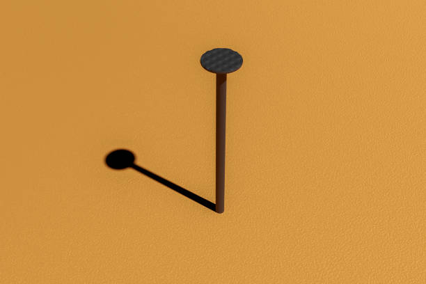 An iron nail sticks out of the wall.