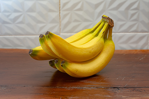Close up view of fresh unripe organic bananas.