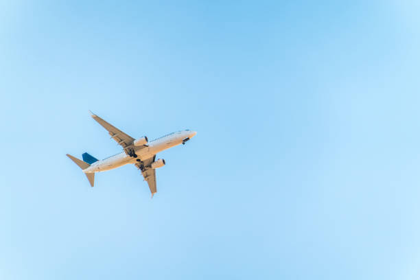 istock Airplane before landing in blue sky, Boeing 737-800 2072568440