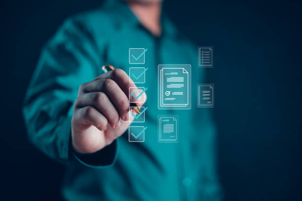 istock Businessman showing check mark summarizing job Compile lists, votes, and to-do lists. Checklists, task lists, and summaries description checklist Documents and online quality assessment standards 2072593221