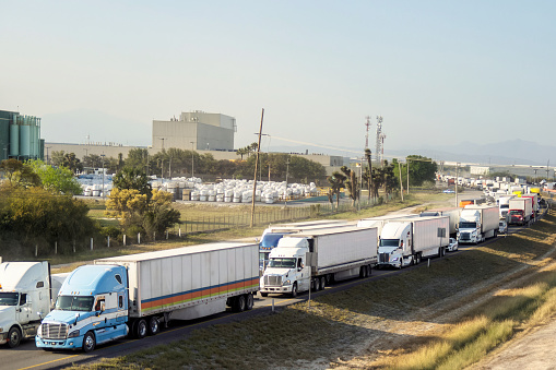 Group of trailers stuck in traffic on a highway