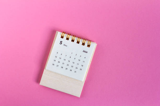 istock Planning calendar for May 2024 on a pink background. 2072722842