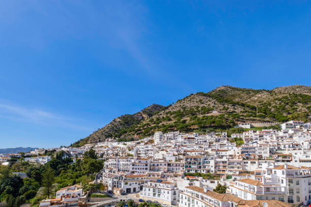 Whitewashed houses of Mijas, a beautiful town with typically whitewashed Andalusian houses and nestled in a mountain landscape