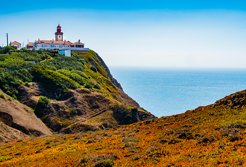 Cabo da Roca or Cape Roca is a cape which forms the westernmost point of the Eurasian landmass. This point includes a lighthouse that started operation in 1772