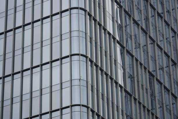istock High-rise building with blue glass windows 2072812312