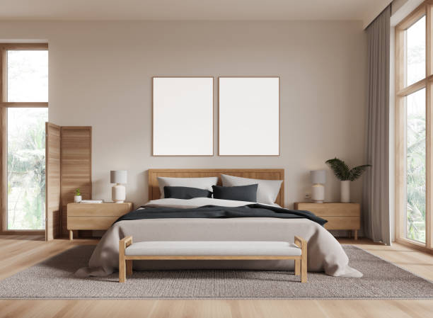 istock Beige hotel bedroom interior with bed and decoration. Mockup frames 2072835398