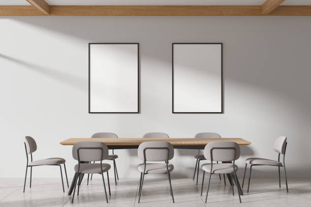 istock Modern home living room interior with chairs and eating table, mockup frames 2072843772