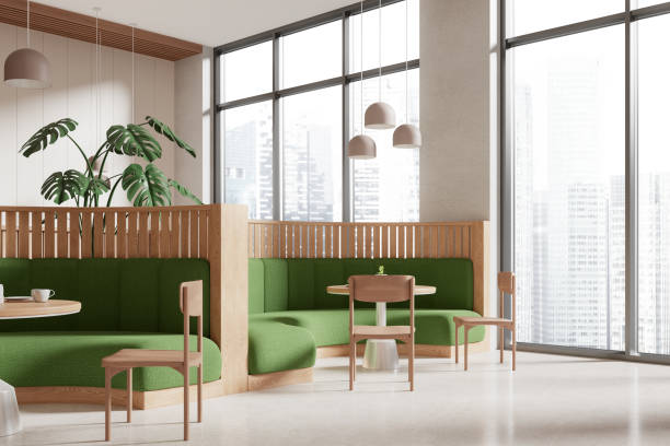 istock Stylish cafe interior with chairs and sofa in row near panoramic window 2072844824