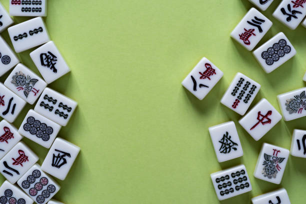 istock Mahjong tiles lined up on a green background 2072845902