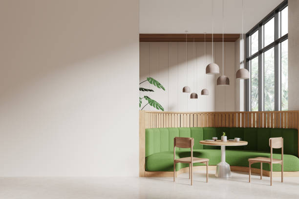 istock Cafe interior with chairs and sofa in row near panoramic window. Mockup wall 2072849083